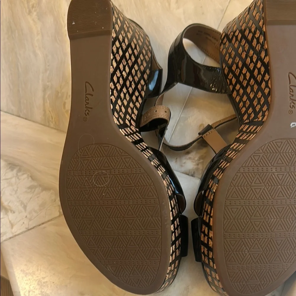 Clarks Black Wedge Escadrille Sandals with Ankle Straps and Cut-Out Design